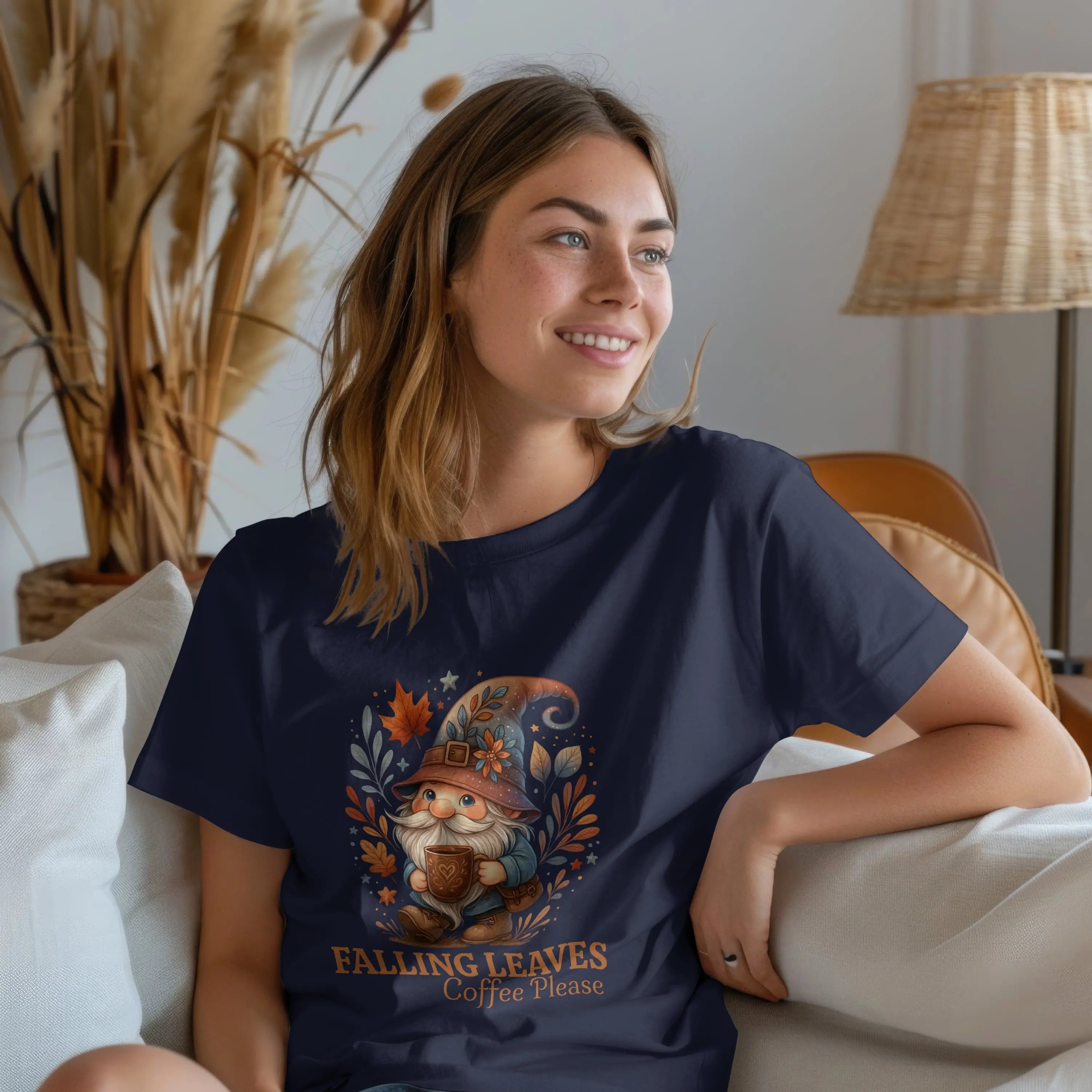 Falling Leaves Gnome T-Shirt | Cozy Autumn Tee, Seasonal Gift, Cute Fall Apparel, Halloween Top, Thanksgiving Outfit Printify