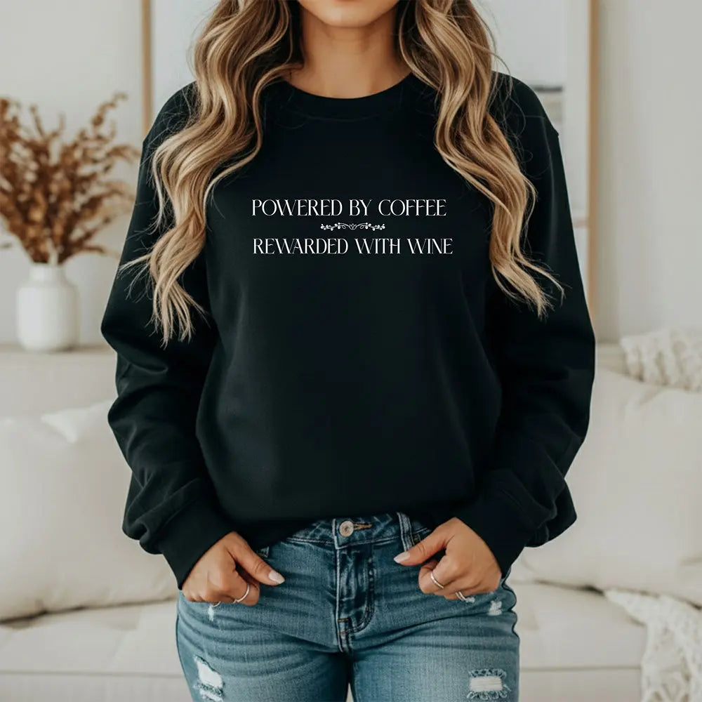"Powered by Coffee, Rewarded with Wine" Crewneck Sweatshirt — Cozy Casual Coffee & Wine Lover Pullover Printify