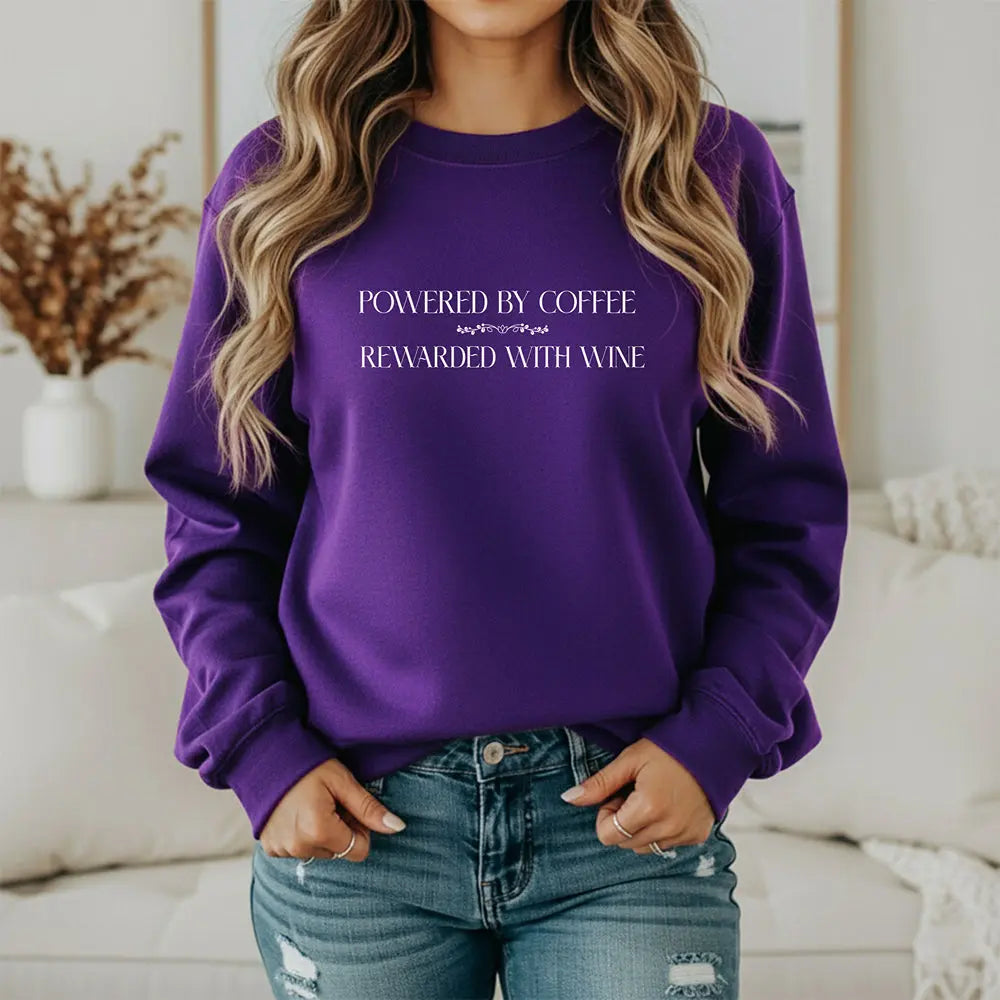 "Powered by Coffee, Rewarded with Wine" Crewneck Sweatshirt — Cozy Casual Coffee & Wine Lover Pullover Printify