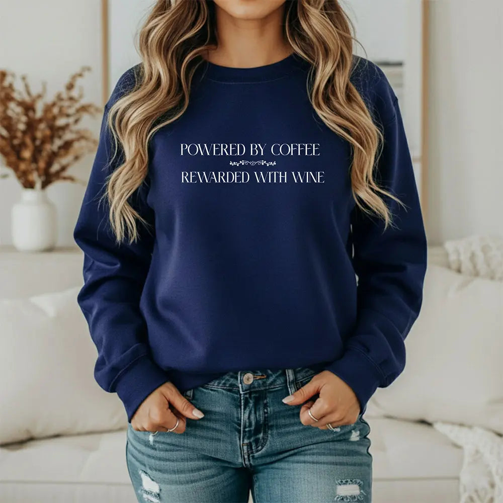 "Powered by Coffee, Rewarded with Wine" Crewneck Sweatshirt — Cozy Casual Coffee & Wine Lover Pullover Printify