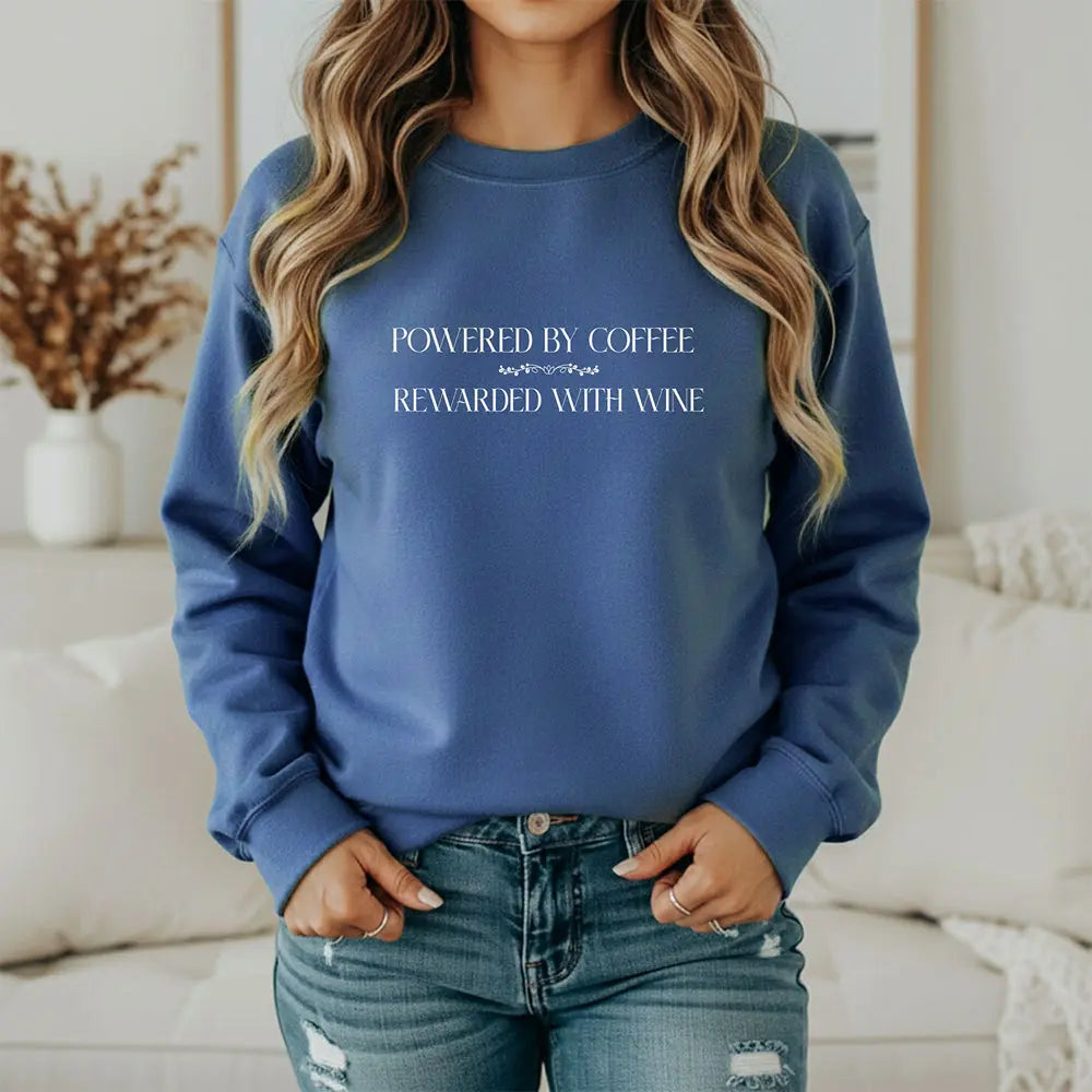 "Powered by Coffee, Rewarded with Wine" Crewneck Sweatshirt — Cozy Casual Coffee & Wine Lover Pullover Printify