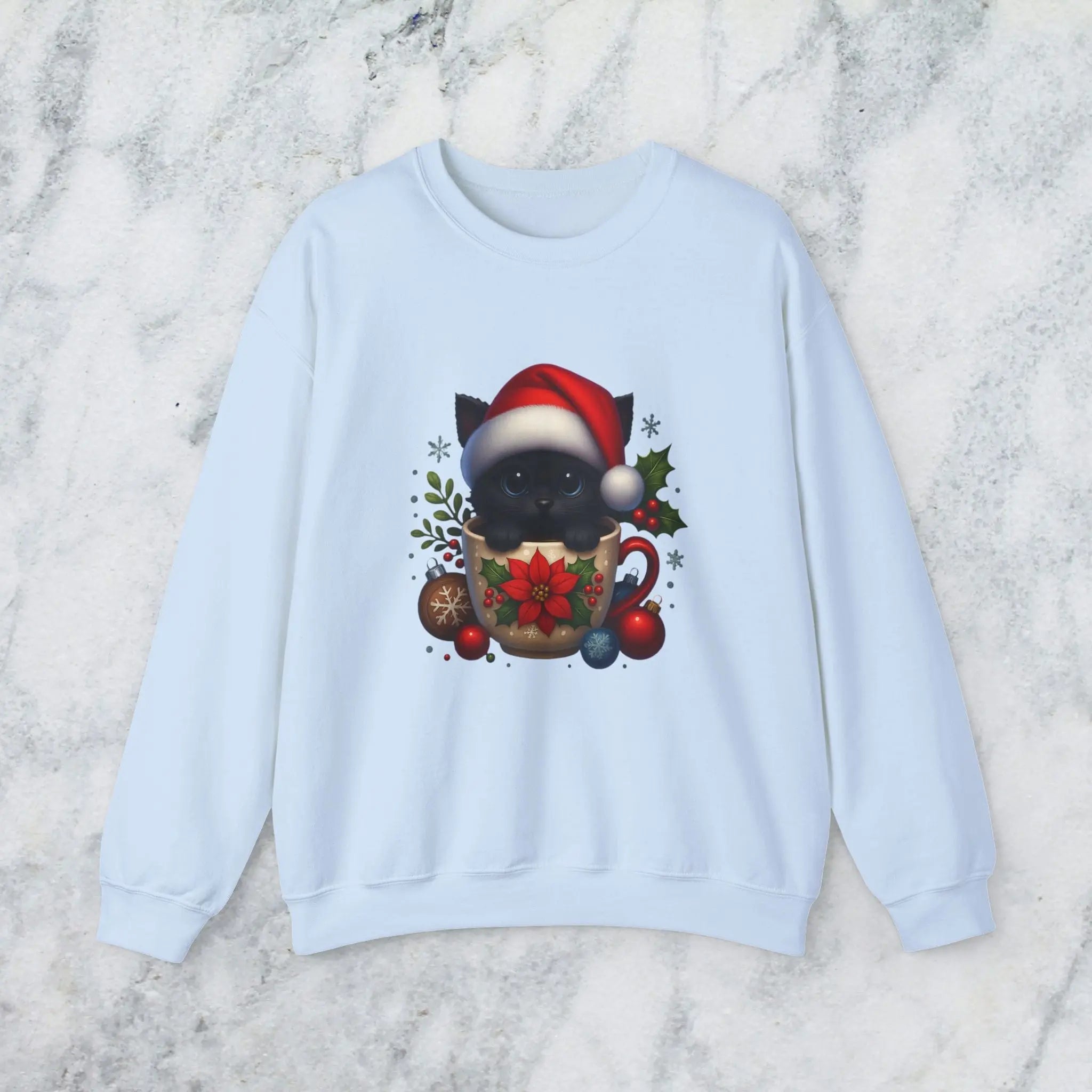 Christmas Kitten Coffee Cup Sweatshirt — Cute Black Cat in Santa Hat Holiday Crewneck Printify
