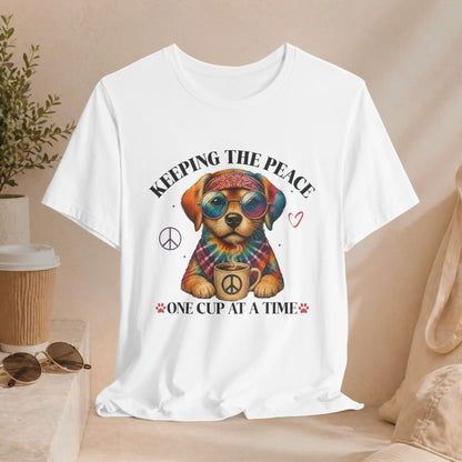 Keeping the Peace Puppy T‑Shirt — "One Cup at a Time" Coffee & Peace Dog Tee Printify