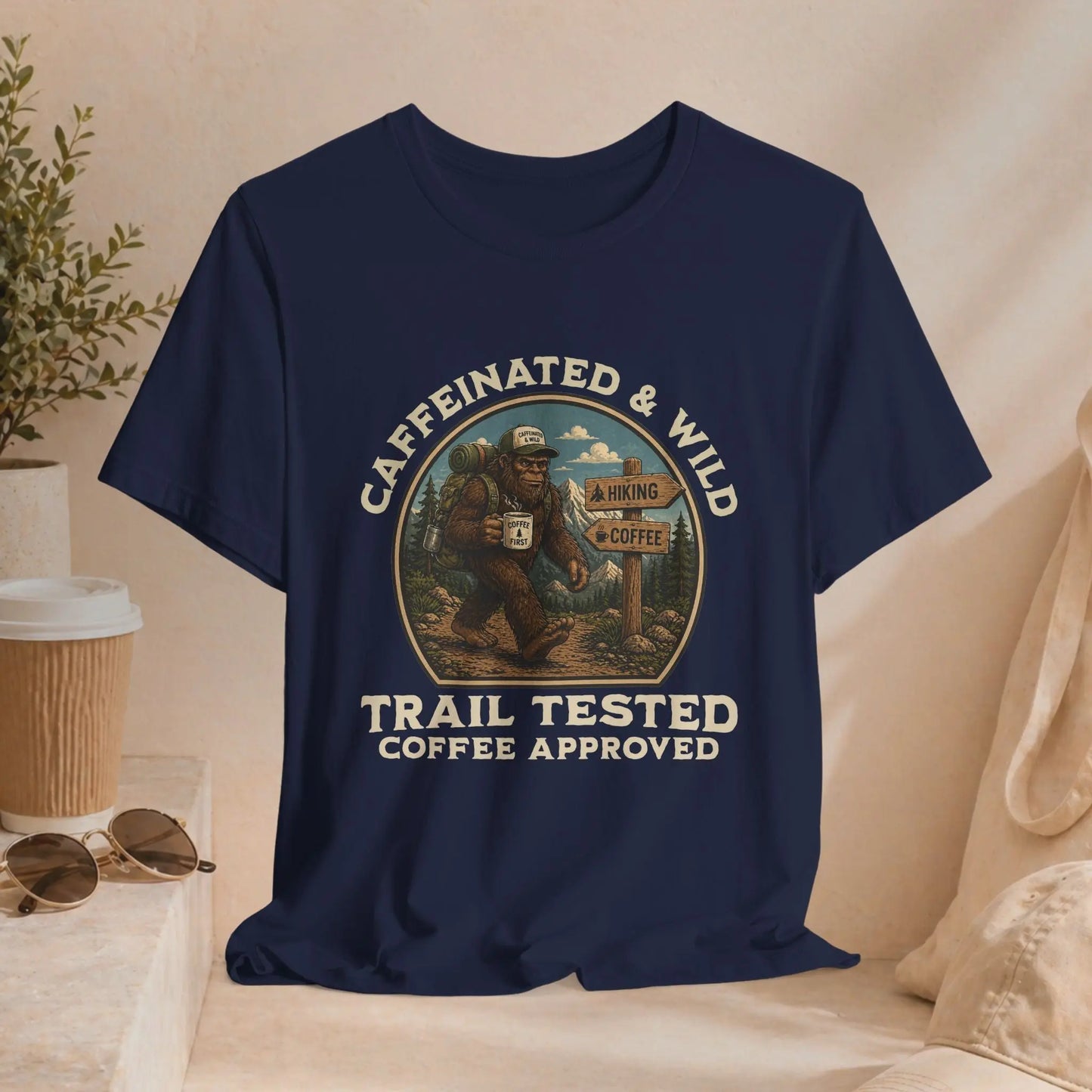 Caffeinated & Wild Tee — "Trail Tested Coffee Approved" Big Foot, Coffee, and Outdoor Hiking T-Shirt Printify
