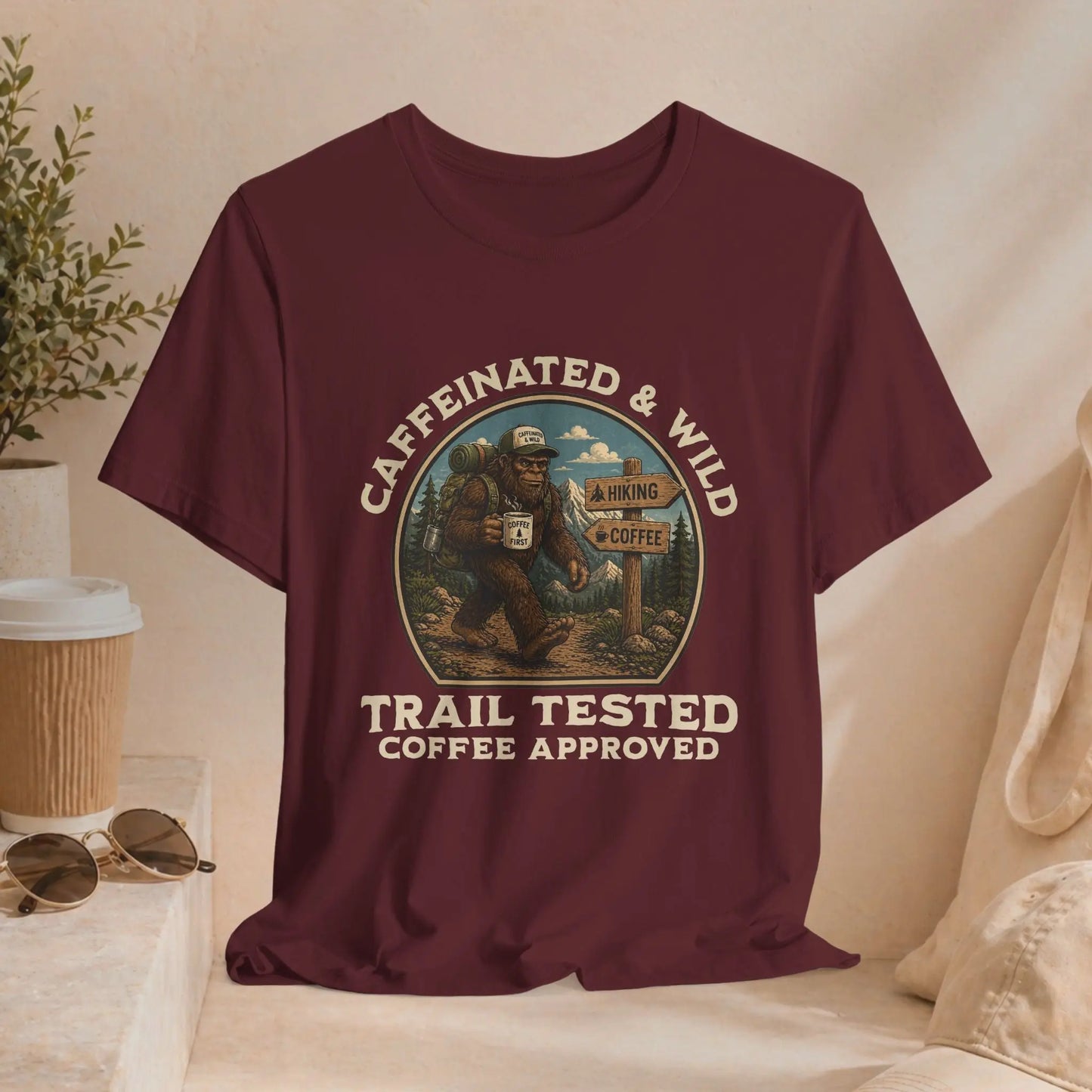 Caffeinated & Wild Tee — "Trail Tested Coffee Approved" Big Foot, Coffee, and Outdoor Hiking T-Shirt Printify
