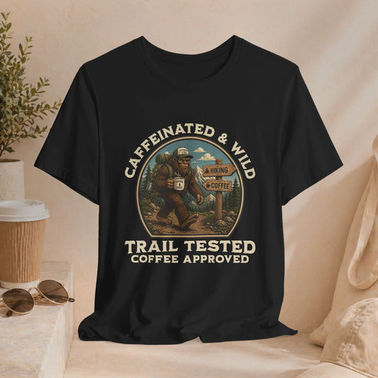 Caffeinated & Wild Tee — "Trail Tested Coffee Approved" Big Foot, Coffee, and Outdoor Hiking T-Shirt Printify
