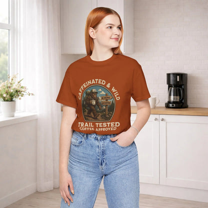 Caffeinated & Wild Tee — "Trail Tested Coffee Approved" Big Foot, Coffee, and Outdoor Hiking T-Shirt Printify